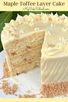 a close up of a cake on a plate with a slice missing from the cake