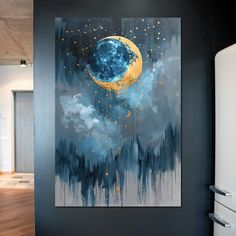 a painting hanging on the wall next to a refrigerator