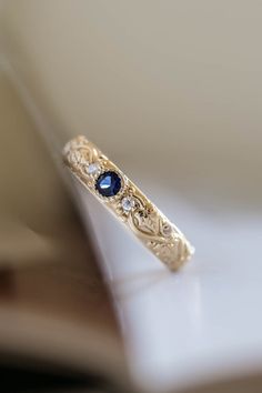 Blue sapphire wedding band, ivy leaf ring with diamonds, comfort fit ring | Eden Garden Jewelry™ Gold Ring With Sapphire, Topaz Wedding Rings, Wedding Ring With Sapphire Accents, Simple Sapphire Ring, Unique Engagement Rings For Men, Alexandrite Wedding Band, Unique Wedding Bands For Women, Elven Ring, Diamonds Wedding Band