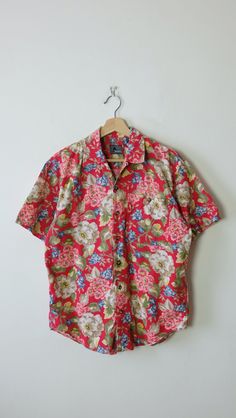 "Women's Red/Floral Short Sleeve Blouse/Women's Shirt. Measurements Length: 26 1/2\" Armpit to armpit: 21\" Shoulder: 17 1/2\"  Shoulder to end of sleeve: 8 1/2\" Condition: Gently used. There's no stains or holes. Good condition.  ※Please read the policy before you purchase※" Red Collared Shirt For Summer, Red Collared Blouse With Relaxed Fit, Red Collared Floral Print Tops, Vintage Red Shirt With Floral Print, Relaxed Fit Red Blouse With Floral Print, Red Floral Print Blouse With Relaxed Fit, Red Cotton Shirt With Floral Print, Collared Red Floral Print Shirt, Red Floral Print Button-up Top