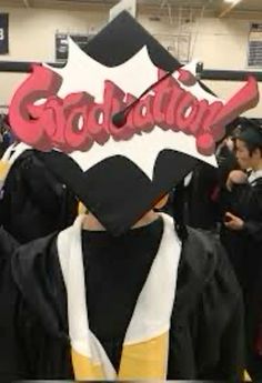 graduates in caps and gowns are lined up at graduation