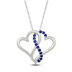 Two hearts collide in the prettiest way in this sweet and shimmering necklace. Sterling silver Two open hearts are entwined in the polished pendant Along the center, a curved ribbon of round blue lab-created sapphires shines 18-inch rope chain; spring ring clasp Sapphire Heart Pendant Jewelry For Valentine's Day, Anniversary Sapphire Jewelry With Heart Charm, Sapphire Heart Pendant For Anniversary, Sapphire Heart Pendant Necklace In Sterling Silver, Sapphire Sterling Silver Heart Pendant Necklace, Sterling Silver Heart Cut Sapphire Necklaces, Sterling Silver Sapphire Heart Cut Necklaces, Heart Cut Sapphire Sterling Silver Necklaces, Sapphire Heart Necklaces For Anniversary