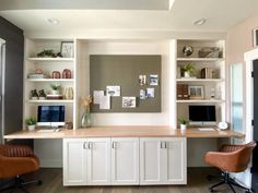 a home office with two computer screens on top of the desk and chairs in front of it