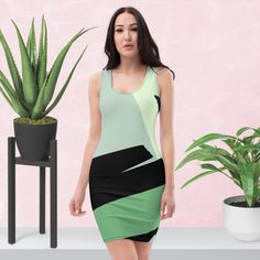 Make a statement and look fabulous in this all-over printed, fitted dress. Bold black stripes accent with shades of green to accentuate. * 82% polyester, 18% spandex * Fabric weight: 6.78 oz/yd² (230 g/m weight may vary by 5% * Made with smooth, comfortable microfiber yarn * Material has a four-way stretch * Blank product components sourced from China This product is made especially for you as soon as you place an order, which is why it takes us a bit longer to deliver it to you. Making products on demand instead of in bulk helps reduce overproduction, so thank you for making thoughtful purchasing decisions! Modern Green Summer Dress, Modern Fitted Bodycon Dress For Summer, Modern Fitted Bodycon Summer Dress, Bold Black, Spandex Fabric, Fitted Dress, Black Stripes, Shades Of Green, Dress Clothes For Women