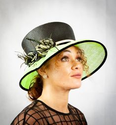 This smart ladies full hat is beautifully hand-blocked in fine black parasisal straw - crown,  and bright green Paris cloth - brim. A sprinkling of black glass seed beads as surface decoration contrasts with the green of the brim. The brim is wired and finished in Petersham ribbon. The hat is trimmed with contrasting Petersham bands and two hand-made pure silk and sinamay 'camellias' with stylized feather detail.  Suitable for a Mother of the Bride or Groom, Ascot or Ladies Day at the Races  Hea Black High Crown Hat For Races, Black High Crown Top Hat For Spring, Black Straw Hat With Flat Brim For Party, Spring Black Top Hat With High Crown, Green Brimmed Mini Hat For Summer, Green Straw Hat With Short Brim, Black High Crown Top Hat, Adjustable Black High Crown Boater Hat, Wide Brim Green Mini Hat For Spring