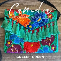 Mexican Embroidered Clutch Crossbody – Camelia Mexican Boutique Multicolor Embroidered Shoulder Bag With Tassels, Embroidered Green Clutch Shoulder Bag, Green Embroidered Clutch Shoulder Bag, Embroidered Clutch As Summer Gift, Embroidered Clutch For Summer Gift, Embroidered Clutch Gift For Summer, Embroidered Green Pouch Clutch, Traditional Embroidered Summer Clutch, Spring Green Floral Embroidered Shoulder Bag