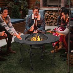 Add warmth to your patio, deck or backyard with this versatile wood burning fire pit table! This round fire pit is ideal for cool nights out on your patio with family or friends, which also can serve as a practical dining table for your indoor activity. Made of heavy duty steel frame with heat-resistant finish, our fire pit table features ex cellent sturdiness and durability. Thanks to its waterproof and rustproof design, you can use it for long-lasting outdoor use in confidence. Plus, the deep Propane Fire Pit Table Patio Decks, Solo Stove Fire Pit Table Backyard, Table Top Fire Pit Wood, Fire Pit Bbq Table, Dinning Table Top Fire Pit, Outdoor Fireplace Tables, Gas Fire Pit Table Deck, Gas Fire Pit Seating, Fire Pit Bar Table