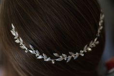 Amazing flexible Bridal Hair accessories , bride headpiece. A special Gentle silver Leaf Hair Wreath with small white Crystals - Hair jewelry that would get you so many compliments on your special day. For more bridal headpiece tiaras in my shop click here: https://www.etsy.com/il-en/shop/Ayajewellery?ref=listing-shop-header-item-count&section_id=18067164 Length: 26 cm / 10.2362 Inches In order to attach this to your hair you must use two small pins that would go into the loops at the ends o Boho Bridal Headband, Leaf Tiara, Gold Leaf Crown, Leaf Headband, Long Bridal Earrings, Headpiece Accessories, Wedding Hair Headband, Leaves Headband, Bride Headband