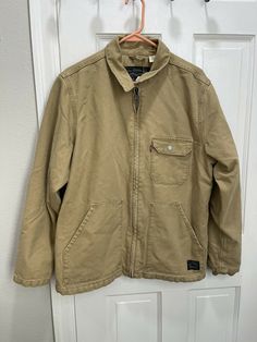 Levi's Men’s Thermore Waller Canvas Work Coat Jacket Men’s Size Medium NWT RARE. Brand new with tags! Fast shipping! Levi's Khaki Outerwear With Pockets, Classic Long Sleeve Outerwear For Outdoor Work, Levi's Long Sleeve Utility Outerwear, Levi's Long Sleeve Outdoor Outerwear, Levi's Long Sleeve Outerwear With Pockets, Canvas Work, Work Coat, Medium Rare, Tan Jacket