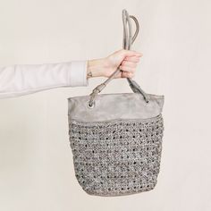 If you love the look and feel of our unstructured Cate and Neela bags, then feast your eyes on the new Clover shoulder bag. With the same woven exterior, a slightly larger body, and comfortable rolled shoulder straps, the Clover is the perfect blend of styles. Call it a small-scale tote or a bucket-style shoulder bag, we know you’ll love it either way! Our signature interior organization and soft top handles are the icings on the cake. 😊 #laticoleathers #leather #leatherbag #clovertote Woven Leather Crossbody Bucket Bag For On-the-go, Evening Shoulder Bag With Double Handle And Woven Leather, Evening Shoulder Bag With Double Handle In Woven Leather, Evening Double Handle Woven Leather Shoulder Bag, Leather Crochet Bucket Bag With Braided Handles, Evening Woven Leather Bucket Bag Tote, Evening Woven Leather Bucket Bag, On-the-go Woven Leather Tote Shoulder Bag, Elegant Leather Crochet Bag For Everyday Use