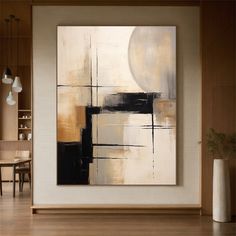 an abstract painting hangs on the wall above a dining room table