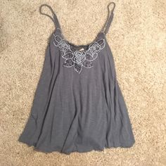 Gray Spaghetti Strap Top Cami With Sparkly Floral Embroidery. Brand Is Eyeshadow. It Was A Gift And It's Not My Style. Size Small. Will Definitely Fit An Xs. Adjustable Straps And Scrunchy Back. Spring Embroidered Spaghetti Strap Tops, Embroidered Spaghetti Strap Tank Top For Spring, Spring Embroidered Spaghetti Strap Tank Top, Casual Floral Embroidered Spaghetti Strap Top, Casual Floral Embroidery Spaghetti Strap Top, Casual Tops With Floral Embroidery And Spaghetti Straps, Spring Embroidered Gray Tops, Spaghetti Strap Top, Strap Top