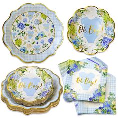 four plates and napkins with the words oh boy written on them in gold lettering