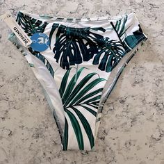 Cupshe High Waisted Leaf Print Bikini Botttom High Waist Tropical Print Swimwear For Beach, Trendy High-waisted Swimwear For Vacation, Fitted Tropical Print Bottoms For Vacation, White High Waist Swimwear For Beach Season, White High-waist Swimwear For Beach Season, White Summer Bottoms For Pool, Trendy White Swimwear For Vacation, White Bottoms For Poolside Vacation, White Poolside Bottoms For Vacation