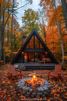 A stunning A-frame cabin surrounded by vibrant autumn foliage in Michigan. Warm light spills from the cabin windows, creating a cozy and inviting atmosphere, while a fire pit with outdoor seating completes the idyllic forest getaway setting.