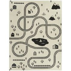 a black and white rug with train tracks on it