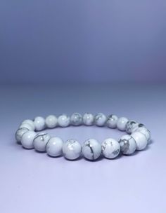 Howlite is a stone of awareness. It can help you to remain calm and centered in times of stress or chaos. Howlite also aids in the development of patience, tolerance, and understanding. Wearing a howlite bracelet can help you to stay connected to the peace and tranquility that resides within you. Remain Calm, Howlite Bracelet, Valentines Sale, Energy Bracelets, Bracelet Gemstone, Healing Jewelry, Crystal Shop, Stay Connected, Gemstone Bracelets