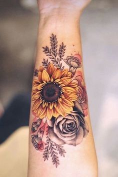 a sunflower and roses tattoo on the wrist