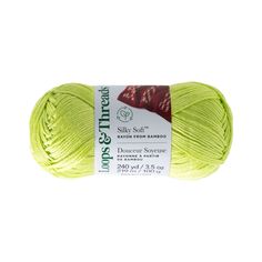 a ball of yarn that is bright yellow