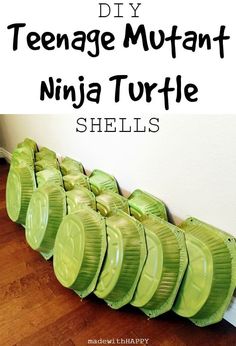 there is a pile of green plates on the floor with text overlay that reads diy teenage mutant ninja turtle shells