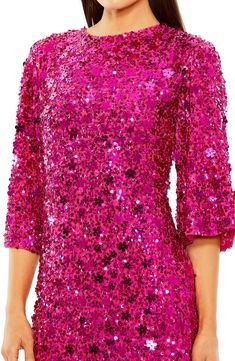 A brilliant cascade of flower-shaped and round sequins elicits a vibrant sparkle on this cocktail dress that will have you gliding from dinner to the dance. 39" length Hidden back-zip closure Jewel neck Three-quarter sleeves Lined 100% polyester Spot clean Imported Asian & Pacific Islander Owned/Founded Pink Glamorous Sequin Dress For Festive Occasions, Glamorous Pink Sequin Dress For Festive Occasions, Glamorous Spring Embellished Sequin Fabric, Glamorous Embellished Sequin Fabric For Spring, Glamorous Festive Sequin Cocktail Dress, Pink Sequin Fabric For Evening, Glamorous Sequin Fabric For Cocktail In Spring, Pink Embellished Sequin Fabric For Cocktail, Pink Embellished Sequin Dress For Festive Occasions