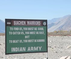 a sign in the middle of nowhere telling people to find out what is behind it