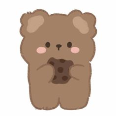 a brown teddy bear holding a piece of chocolate in its paws with one eye open