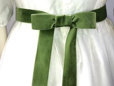 Bridal belt made of velvet of the highest quality from Switzerland with a solid touch and soft surface in shiny color depth.This bow succeeds anyone in an instant and remains as beautiful as the first moment thanks to the patented closure. Two types of application possible. Bow can be worn in front and behind. Velvet - ribbon is 4 cm wide and 3 meters long for adults and 1.5 meters in the children's version. The ends of the ribbons are cut crosswise and sealed to prevent fraying. Surrounded is e Fitted Green Dress With Bow Tie Back, Elegant Fitted Green Sashes, Wedding Dress Ball Gown, Velvet Belt, Perfect Bow, Dress Ball Gown, Wedding Sash Belt, Green Sage, Bow Belt