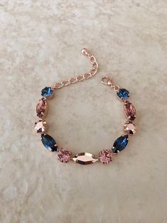 Navy blue light burgundy Rose gold Swarovski crystal | Etsy Blue And Rose Gold, Dainty Jewelry Necklace, Light Burgundy, Inexpensive Jewelry, Pretty Jewelry Necklaces, Rose Gold Crystal, Swarovski Crystal Bracelet, Magical Jewelry, Fancy Jewellery