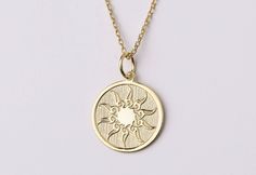 "14k Gold Sunshine Sun Necklace, Personalized Sunshine Sun Pendant, Celestial Jewelry, Sunburst Necklace, Sunbeam Necklace, Sun Charm Necklace, Necklace for Woman, Necklace for Man, Gold Gift Necklace, Custom Engraved Charm * Material: Pendant and chain are 14k Yellow Solid Gold or Sterling Silver * Pendant thickness: 0.70 mm * Inner diameter of jump ring: 4 mm * Pendant diameter: 0.55 inch (14 mm) 0.60 inch (15.30 mm) 0.65 inch (16.50 mm) 0.70 inch (17.78 mm) 0.75 inch (19.10 mm) * Chain length Sunburst Necklace, Necklace Sun, Woman Necklace, Sun Charm, Sun Necklace, Sun Pendant, Casting Jewelry, Celestial Jewelry, 14k Gold Necklace