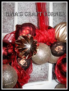 red and silver christmas wreath with ornaments