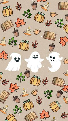 two white ghostes surrounded by autumn leaves and pumpkins, with books on them