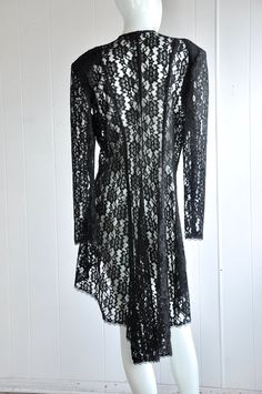 "A gorgeous 2-piece dress and jacket featuring sequins, beads, and lace. The jacket has a hidden eye and hook closure. There are two front panels that end in beads. Has shoulder pads. Brand is Dollar. Vintage size 17. Seems suited for a modern-day large, but please see below for accurate fit. CONDITION: Wonderful. No flaws to note. MEASUREMENTS JACKET Bust: 44\" Waist: 34\" Length: 46\" Shoulder span: 18\" Sleeve: 25\" DRESS Bust: 38\" Waist: 34\" Hips: 40\" Length: approx. 38\" Have a question? Gothic Lace Dress For Party, Gothic Lace Dress For Evening, Party Lace Dress With Long Sleeves And Lace Collar, Long Sleeve Lace Dress With Lace Collar For Party, Gothic Lace Party Dress, Fitted Lace Dress With Patchwork For Fall, Fitted Lace Patchwork Dress For Fall, Gothic Fitted Lace Dress For Parties, Fitted Lace Dress For Evening In Fall