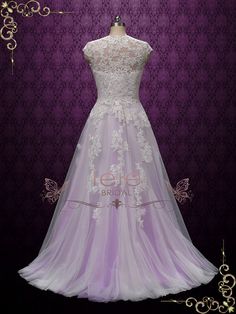 a dress on display in front of a purple background