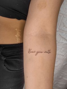 a woman with a tattoo on her arm that says, don't you write?