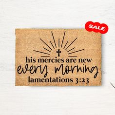 a door mat that says, his mercies are new every morning lamentations 3 23