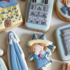 some cookies are decorated to look like they have been made in different shapes and sizes