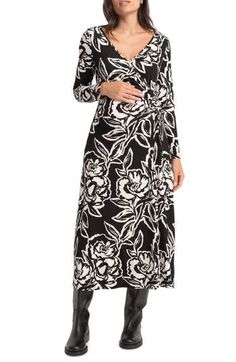 A ruched detail effortlessly showcases your growing bump in this long-sleeve maxi dress with a bold floral pattern all over. Slips on over head Surplice V-neck Long sleeves 95% viscose, 5% elastane Machine wash, line dry Imported Black Long Sleeve Dress With Floral Print, Long Sleeve Maternity Maxi Dress For Fall, Maternity Maxi Dress With Long Sleeves For Fall, Maternity Long Sleeve Maxi Dress For Fall, Black Floral Print Maxi Dress For Winter, Winter Black Maxi Dress With Floral Print, Fitted Long Sleeve Floral Print Maxi Dress, Winter Floral Print Maxi Dress, Elegant Floral Print Maxi Dress For Winter