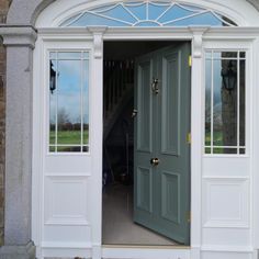 an open door leading into a large building