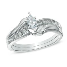 a white gold engagement ring set with diamonds