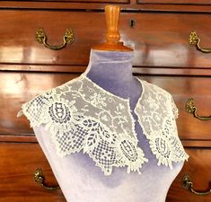 An antique machine embroidered tulle and Schiffli lace collar.  The collar is approximately 18 1/2" (47cm) around the neck edge and 7 1/2" (19 cm) deep at the back.  It is in very good condition with a smaal break in the tulle, at the back, see photographs. All the items I sell have had a previous life, so may have some small marks etc. I do try to mention anything, but occasionally I may miss something. Some of my own collection can be seen at gardenhill_antique_lace on Instagram. Bib Collar, Embroidered Tulle, Antique Lace, Break In, Previous Life, Lace Collar, Scarf Wrap, Scarf Accessory, Purses And Bags