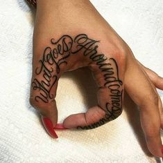 a woman's hand with the word happy birthday written in cursive writing on it