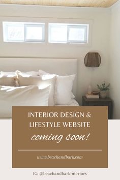 a bed with white sheets and pillows in a bedroom next to a window that reads, interior design & lifestyle website coming soon