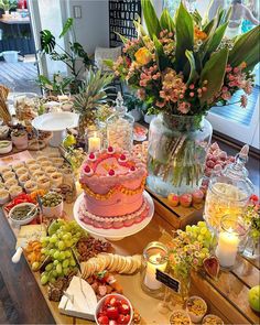 a table filled with lots of food and desserts