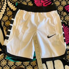 Nike Basketball Shorts, Size Small Nwt White Sports Bottoms With Elastic Waistband, White Stretch Pants With Built-in Shorts, Nike White Pants For Spring, Nike Sporty White Pants, Sporty White Pants With Built-in Shorts, White Short Sports Pants, Stretch White Pants With Built-in Shorts, Nike Sweatshorts, Boys Nike Shorts