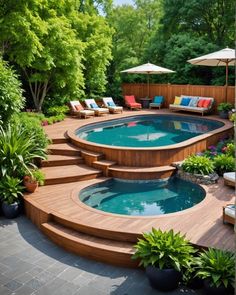 an outdoor swimming pool with steps leading to it and lounge chairs around the pool area