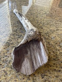 a piece of wood sitting on top of a counter