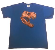 T Rex Dinosaur Shirt, Dinosaur Skull 3D Ink (Sweatshirt,  Hoodie Available On Request) #262f 3-D Puff Specialty ink is very realistic...the print is actually raised up off of the fabric giving the design a texture that almost makes it real! This type of ink prints fairly heavily and stiff to give it the 3-dimensional effect.   Washing instructions: Hand wash or turn inside and wash in a delicate cycle. Dry inside out on low or hang to dry. For Sweatshirts and Hoodies please contact me to request a custom order. Youth Sizes available Design will be printed on the front of the garment unless requested otherwise. The exception to this is hoodies where zippers and pockets may obstruct the printing space. 5XL NOT available in LONG SLEEVE LAVENDER & GREEN  (Please order short sleeve style or a d Dinosaur Shirts, Dinosaur Skull, Dinosaur Shirt, T Rex Dinosaur, Lavender Green, List Ideas, Sweatshirts And Hoodies, Custom Quilts, Plus Size Shirts