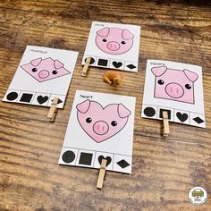 four farm animals cut out on clothes pegs to make them look like they are playing cards