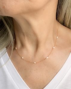 This delicate Tiny Thin Freshwater Pearl Choker Necklace is a stunning piece of handmade bridal jewelry that will make a perfect gift for her, whether she's a bride-to-be or a loving mom. The small, real, natural floating rice pearls are elegantly accented with gold-filled elements, adding a touch of sophistication to any outfit. This dainty choker necklace is a lovely representation of understated elegance and timeless beauty, making it a versatile and cherished addition to any jewelry collecti Dainty Choker Necklace, Choker Necklace Gold, Rice Pearls, Floating Necklace, Dainty Choker, Pearl Choker Necklace, Gold Choker Necklace, Gold Necklace Layered, June Birthstone